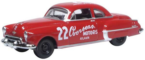 Oxford Diecast 1949 Oldsmobile Rocket 88 - Assembled -- Overseas Motors 22 (red, white) - 553-87OR50004
