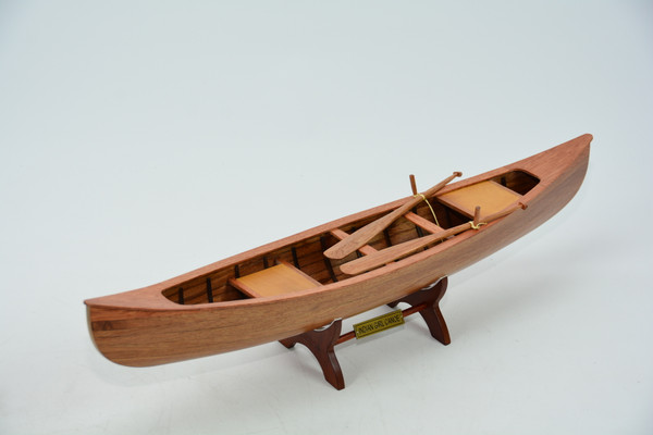 INDIAN GIRL CANOE