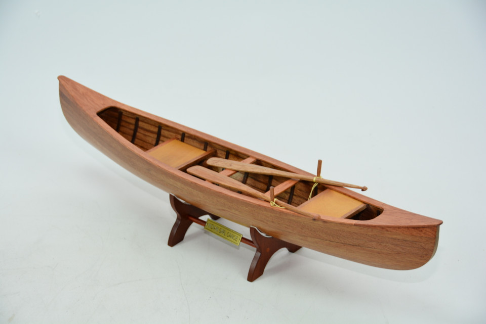 INDIAN GIRL CANOE