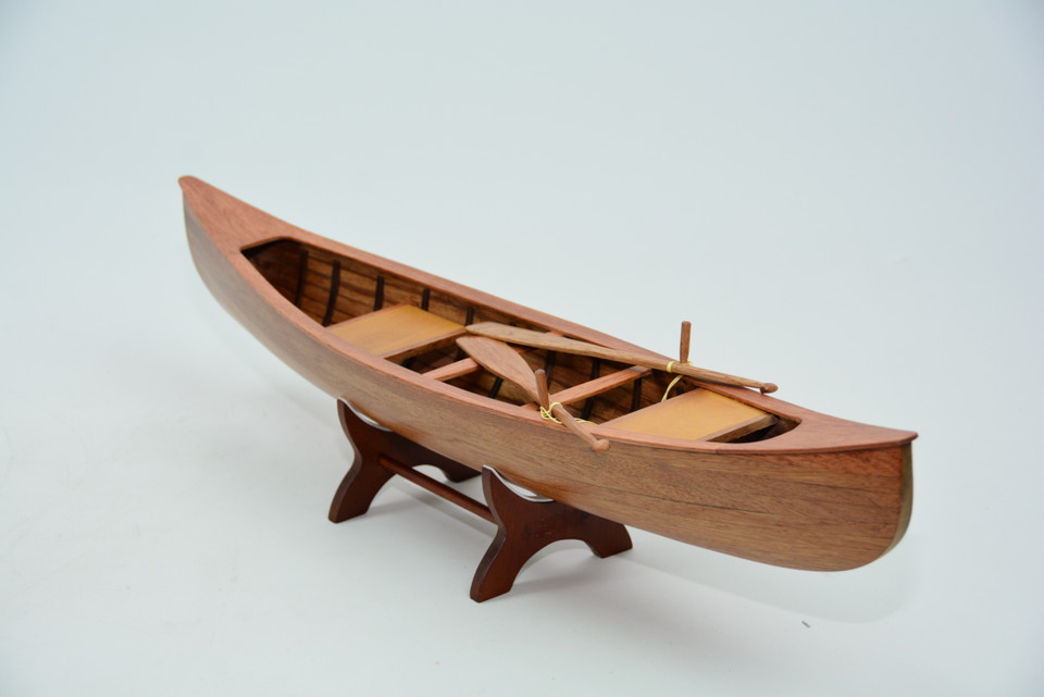 INDIAN GIRL CANOE