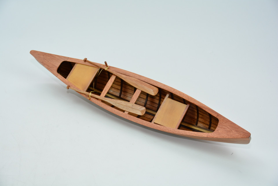 INDIAN GIRL CANOE