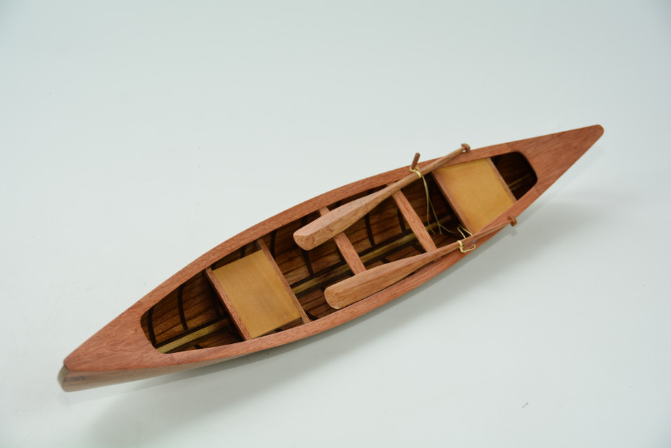 INDIAN GIRL CANOE