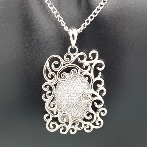 Mystical Pendant Necklace in Silver On Mannequin Close up