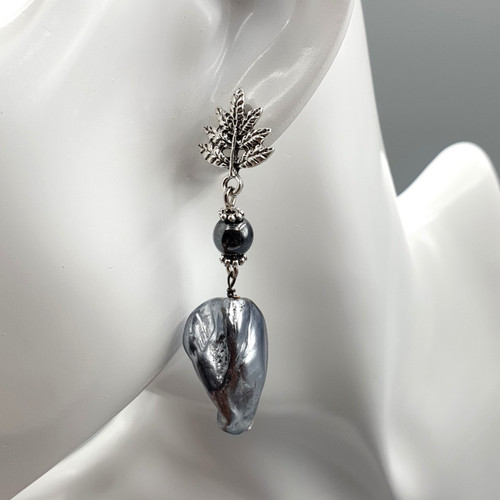 Leafy Baroque Shell Pearl Drop Earrings in Silver Finish Front view On Mannequin