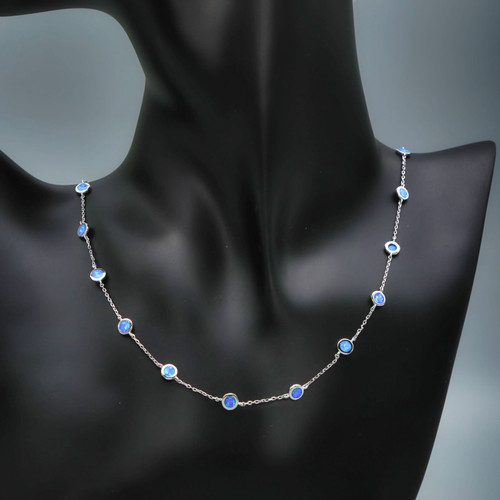 Sterling Silver Simulated Blue Opal Circle Necklace  On Mannequin