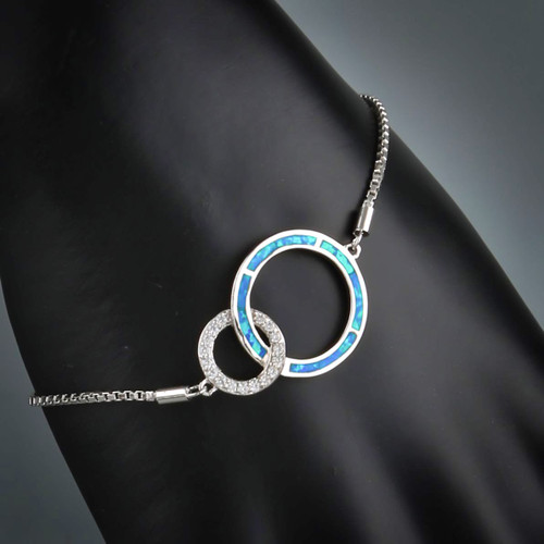 Sterling Silver Simulated Blue Opal Linked Rings Slider Bracelet Close up