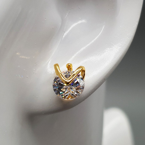 Chevron Stud Earrings in Gold On Mannequin Close up