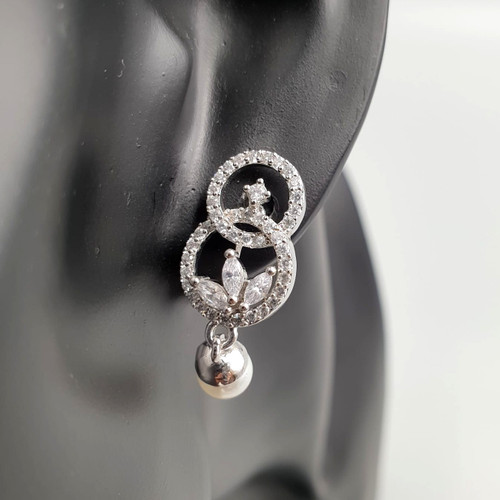 Eternity Drop Earrings in Silver On Mannequin