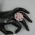 Jolie Fleur Cocktail Ring in Rose Gold and Silver On Mannequin