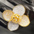 Petite Fleur Cocktail Ring Gold and Silver On Mannequin Close up