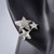 Sterling Silver Cubic Zircon Starry Stud Earrings On Mannequin Right Ear