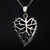 Sterling Silver Filigree Leaf Pendant On Mannequin Close up