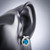 Swiss Blue Topaz and Cubic Zirconia Criss-Cross Halo Earrings in Sterling Silver On Mannequin