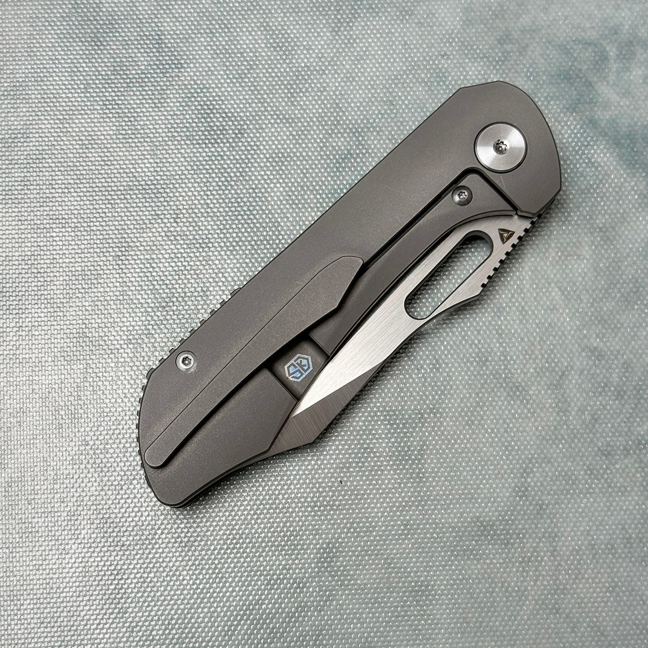Tuya Shocker Frame Lock Titanium Handles Satin 20CV Blade