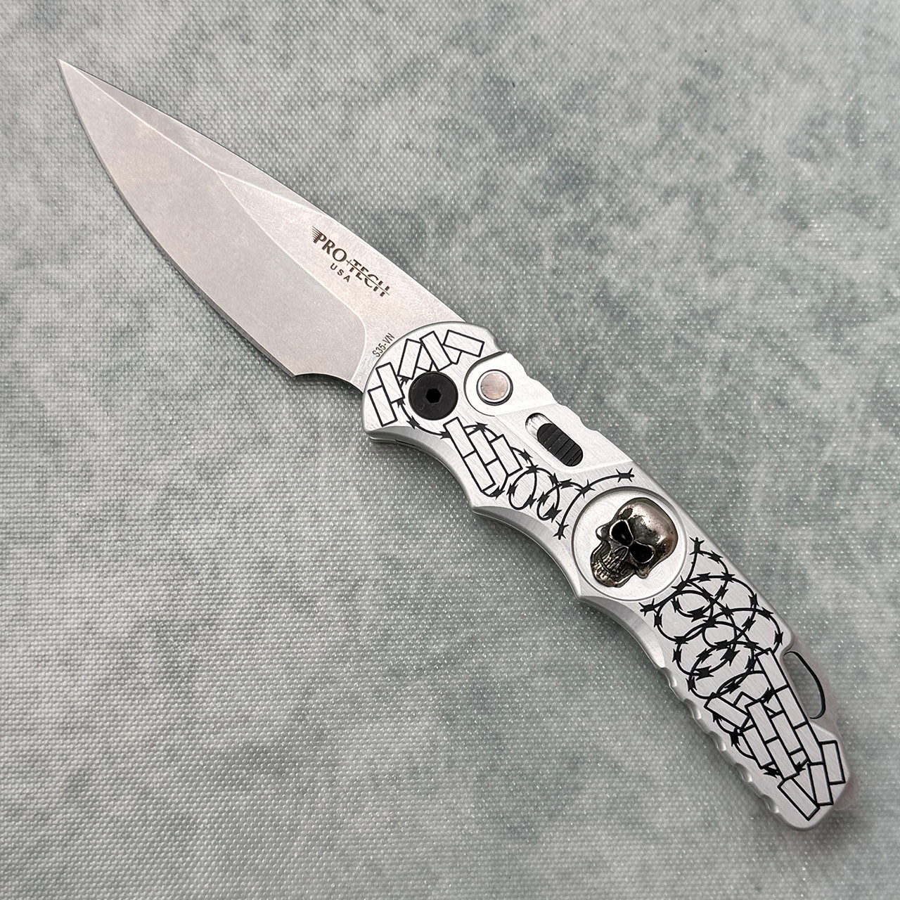 Pro-Tech TR-5.62 2025 SKULL Ltd. Silver Handle w/ Brick Barbwire