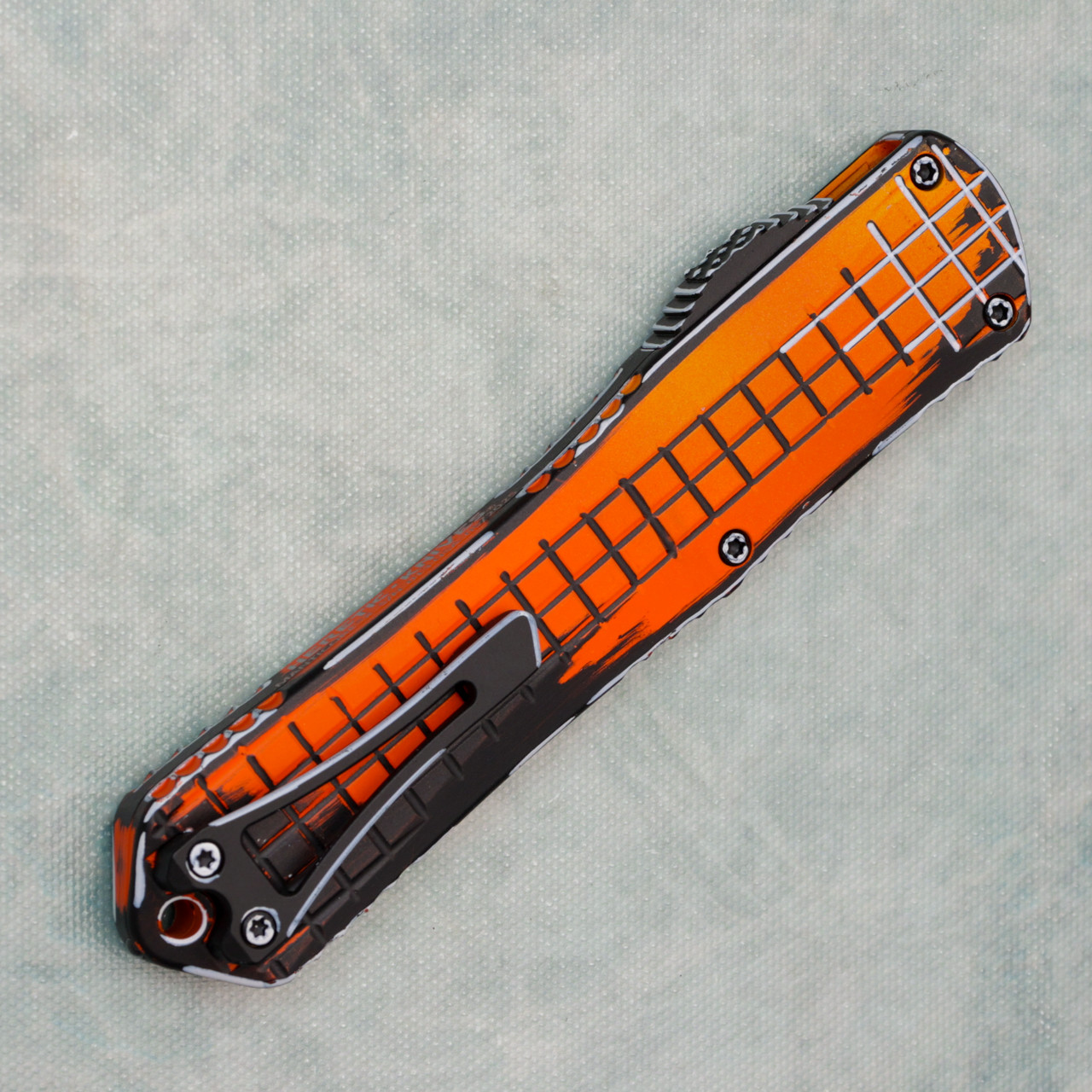 Heretic Knives Manticore X Recurve Orange Cel Shade Handle Orange