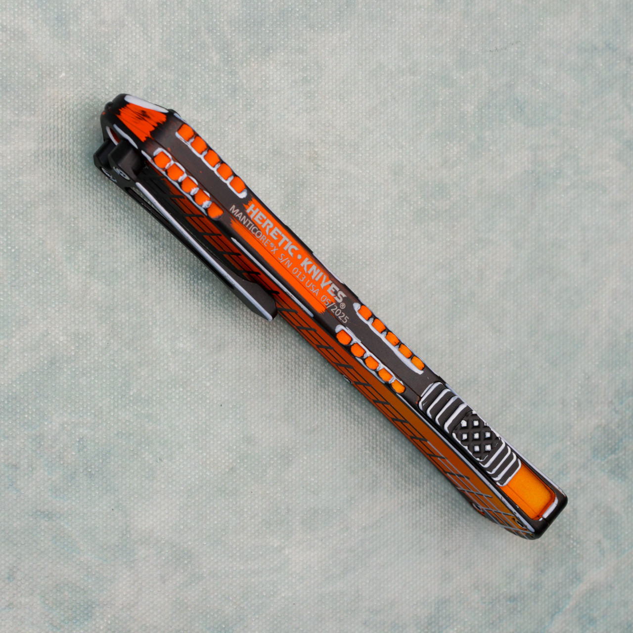 Heretic Knives Manticore X Recurve Orange Cel Shade Handle Orange