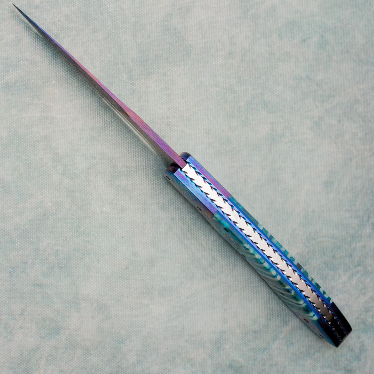 Vallotton Custom Wasp Dual Action Blue/Green Mammoth Molar Handles