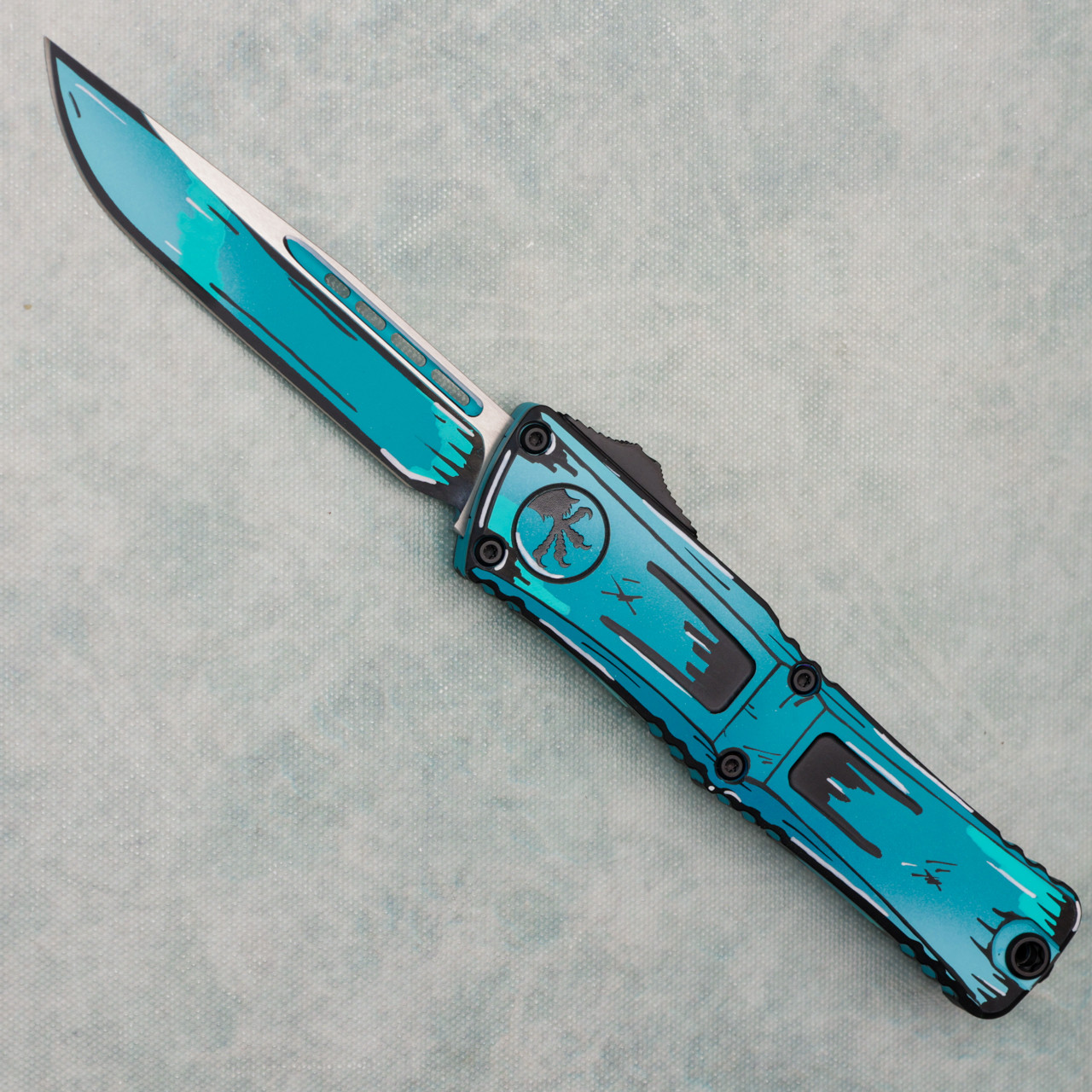 Microtech Combat Troodon S/E Gen III Turquoise Comic Strip