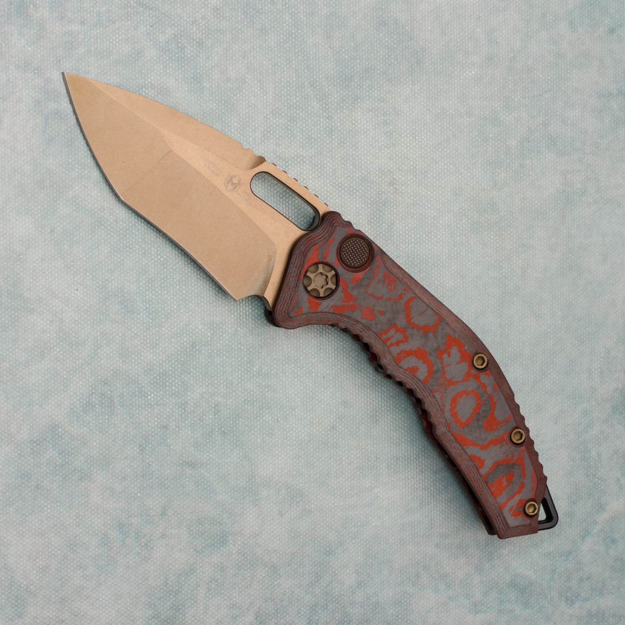 Heretic Knives Medusa Auto Recurve Red Camo Carbon Handle Bronze