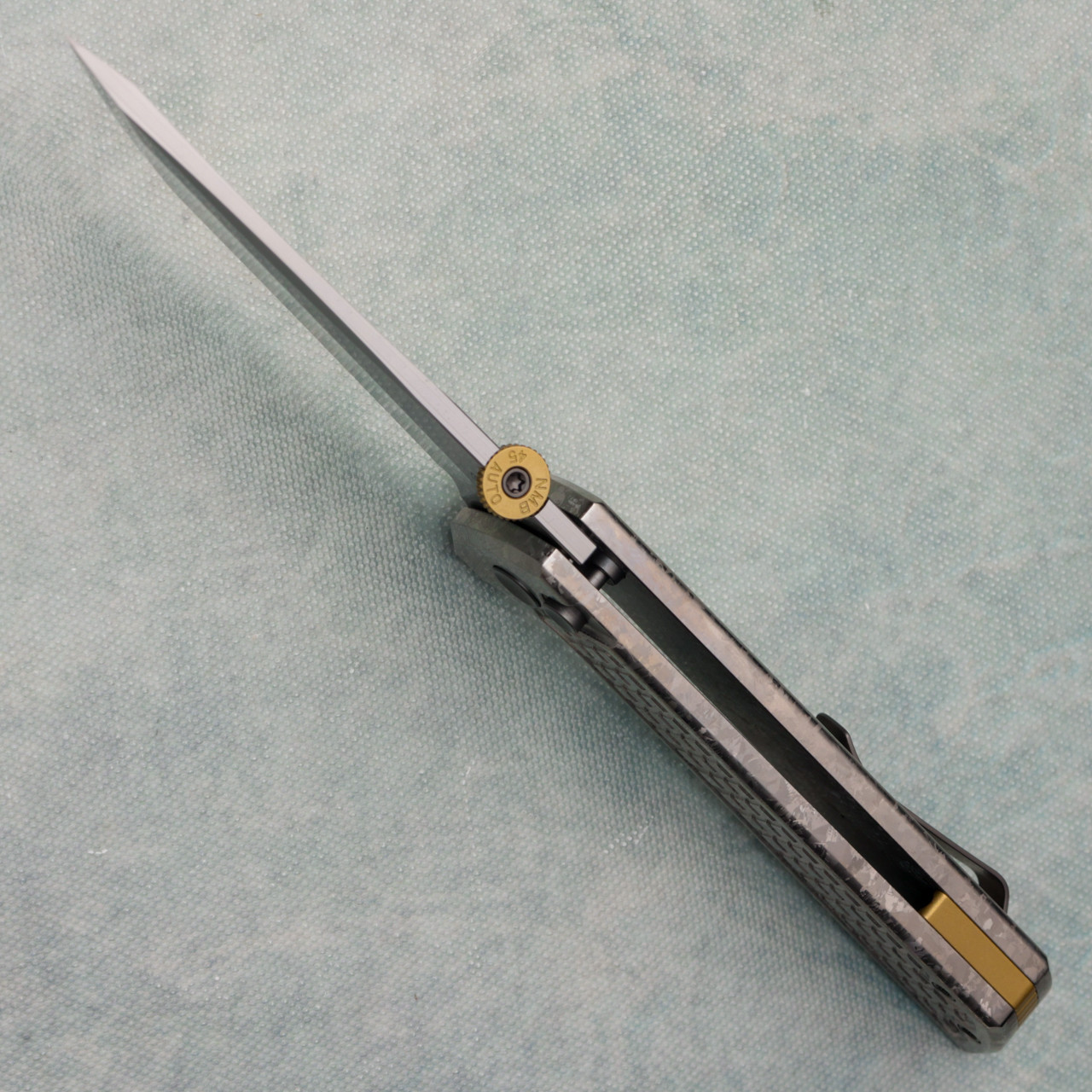 North Mountain Blade Chop 2 Button Lock Crystalized Titanium Ice