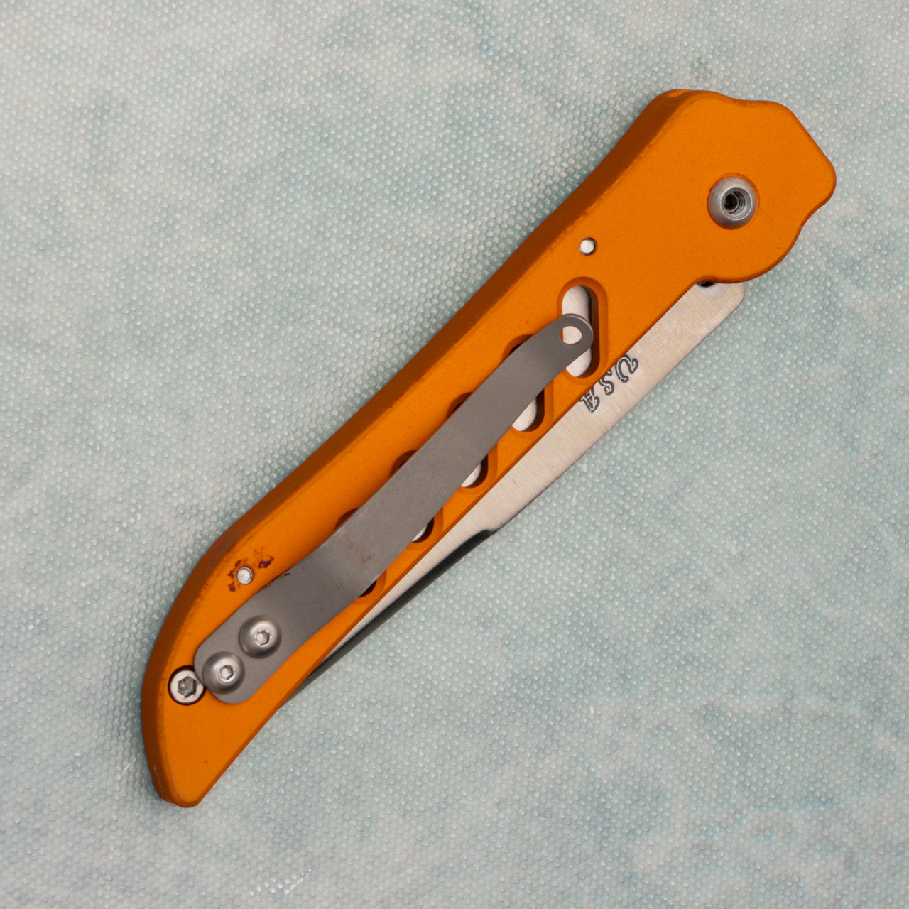 Dalton Super Slim Lite Auto Orange Handle Satin Part Serrated
