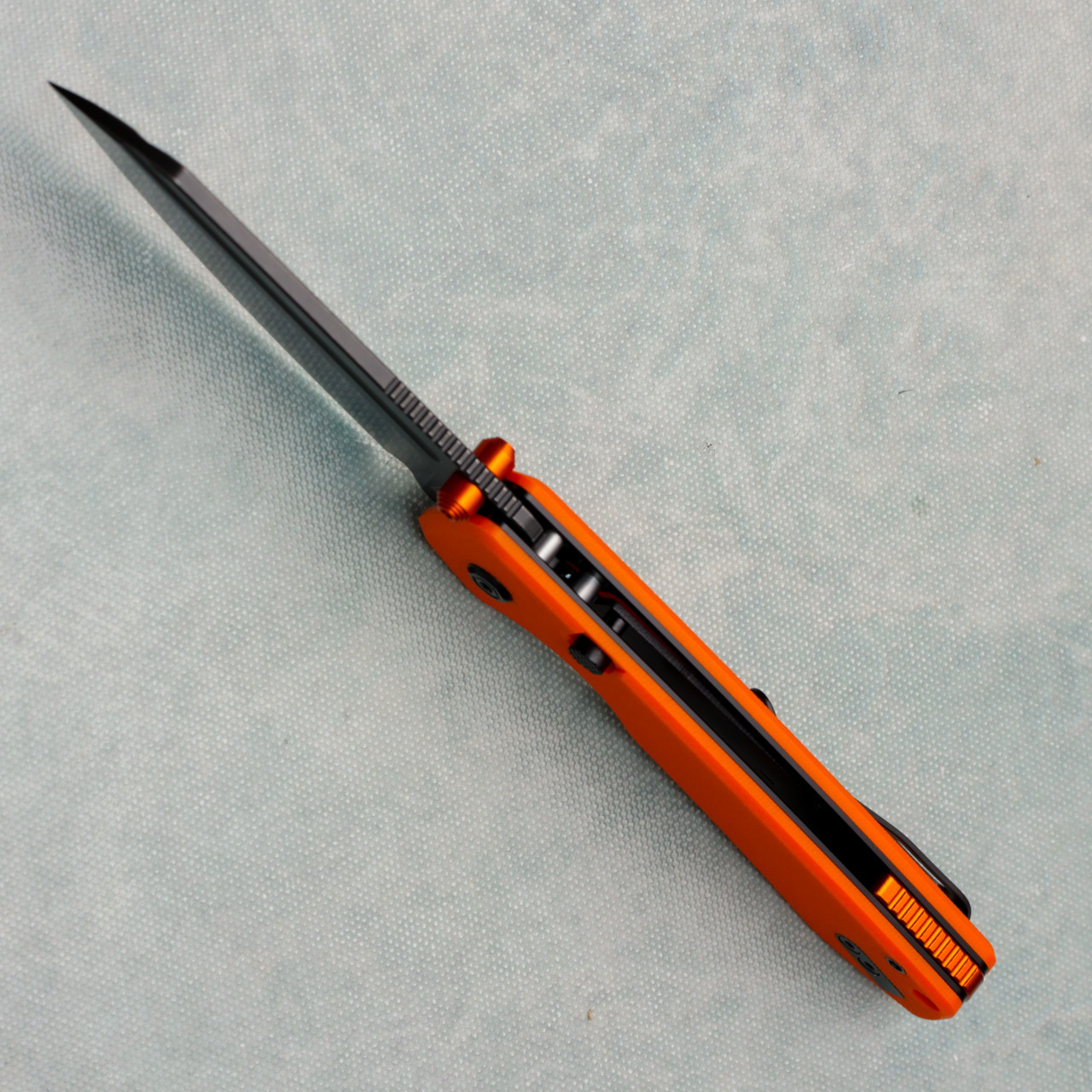 Vosteed Raccoon 2.0 Top Liner Lock Orange G10 Handle Blackwash