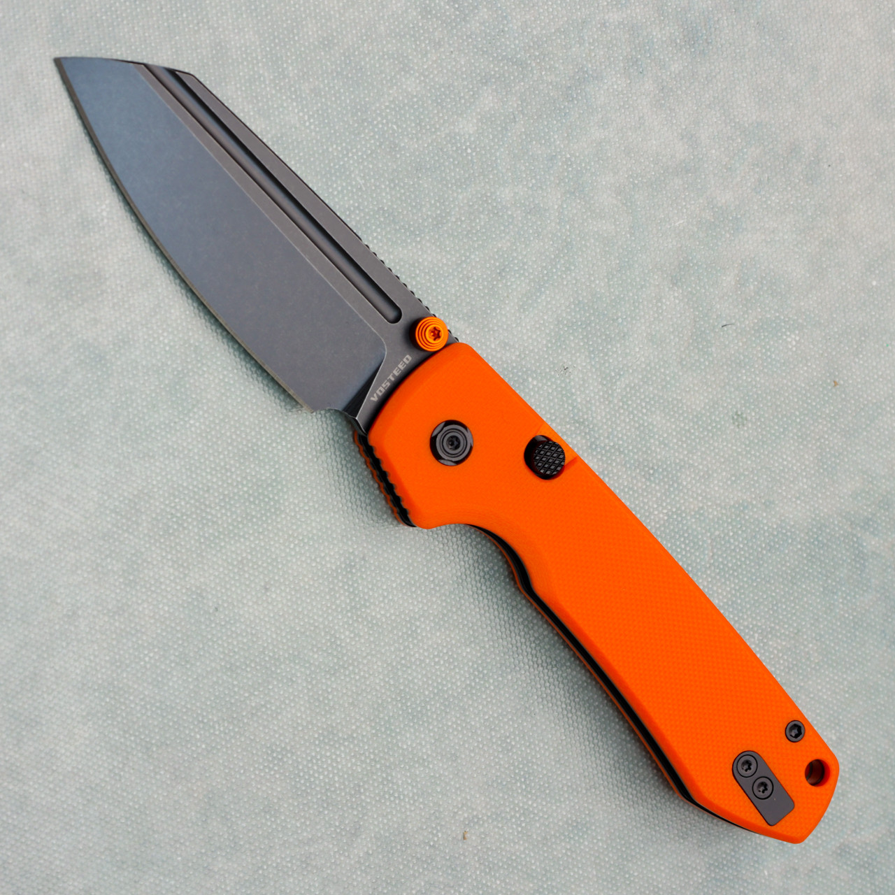 Vosteed Raccoon 2.0 Top Liner Lock Orange G10 Handle Blackwash
