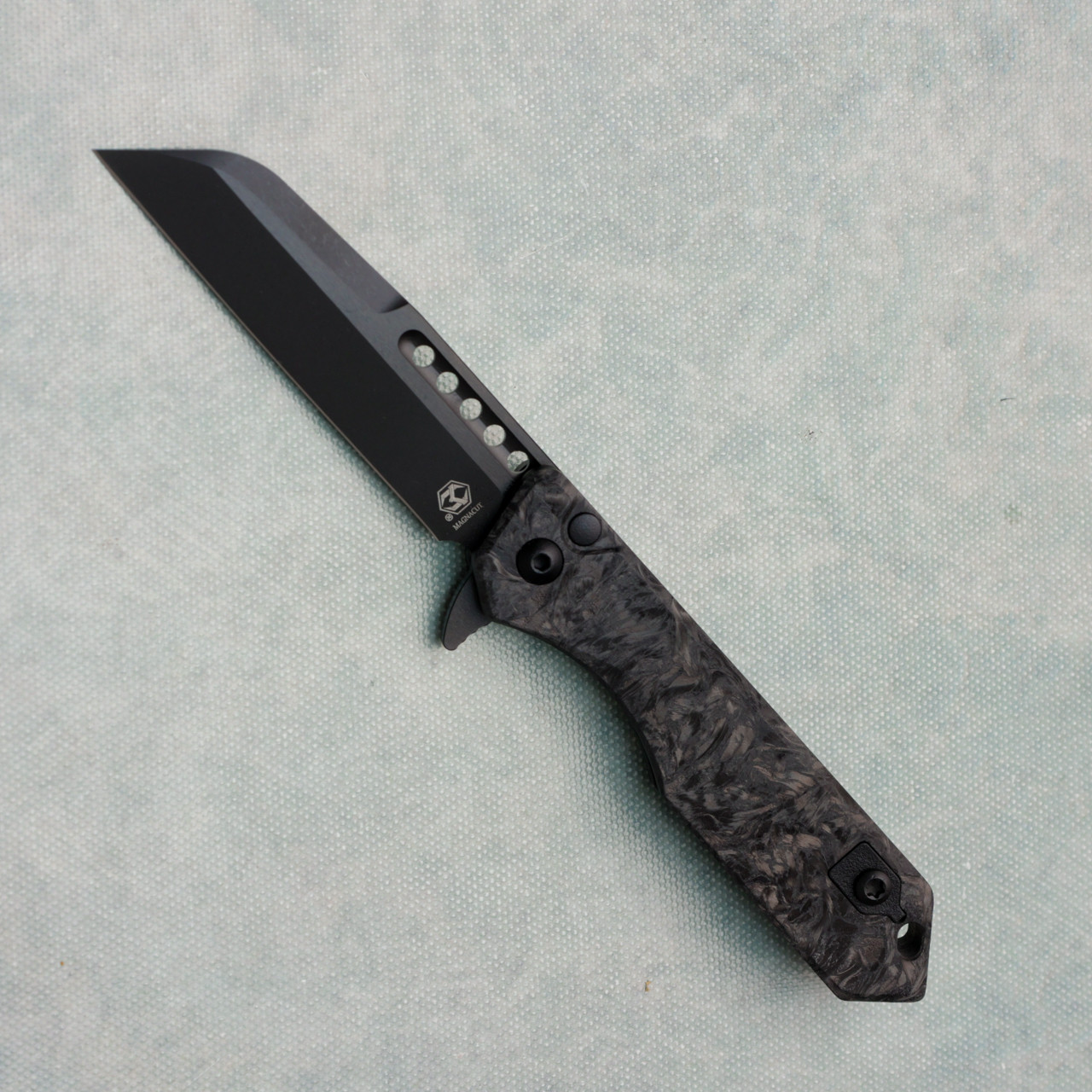 Heretic Knives Jinn Manual Button Lock Marble Glow Carbon Fiber