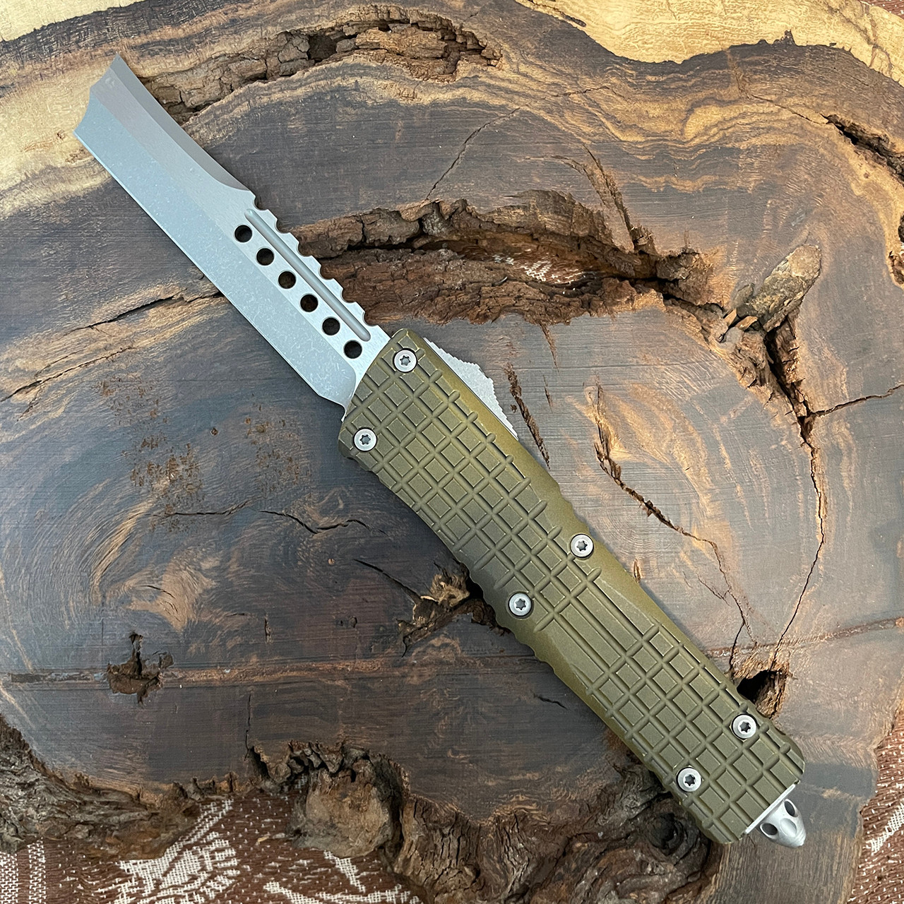 https://cdn11.bigcommerce.com/s-1tyihs272l/images/stencil/1280x1280/products/9031/21027/Microtech219R-10APFRAES-Combat-Troodon-Hellhound-Razor-Frag-Apocalyptic-Earth-Apocalyptic-Standard__98240.1695827686.jpg?c=2