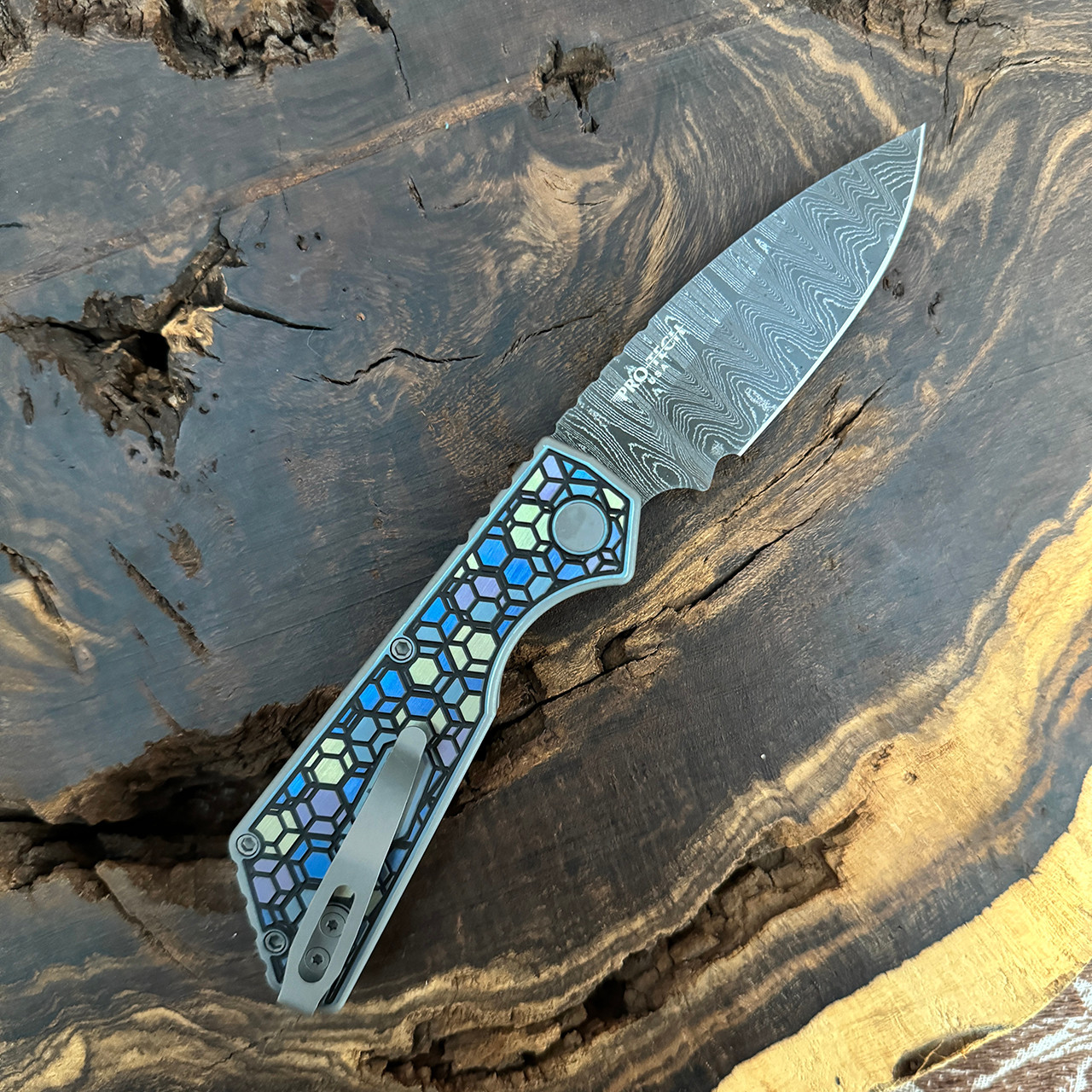 Pro-Tech Strider PT+ Auto Chipped Metal Unique Anodized Titanium