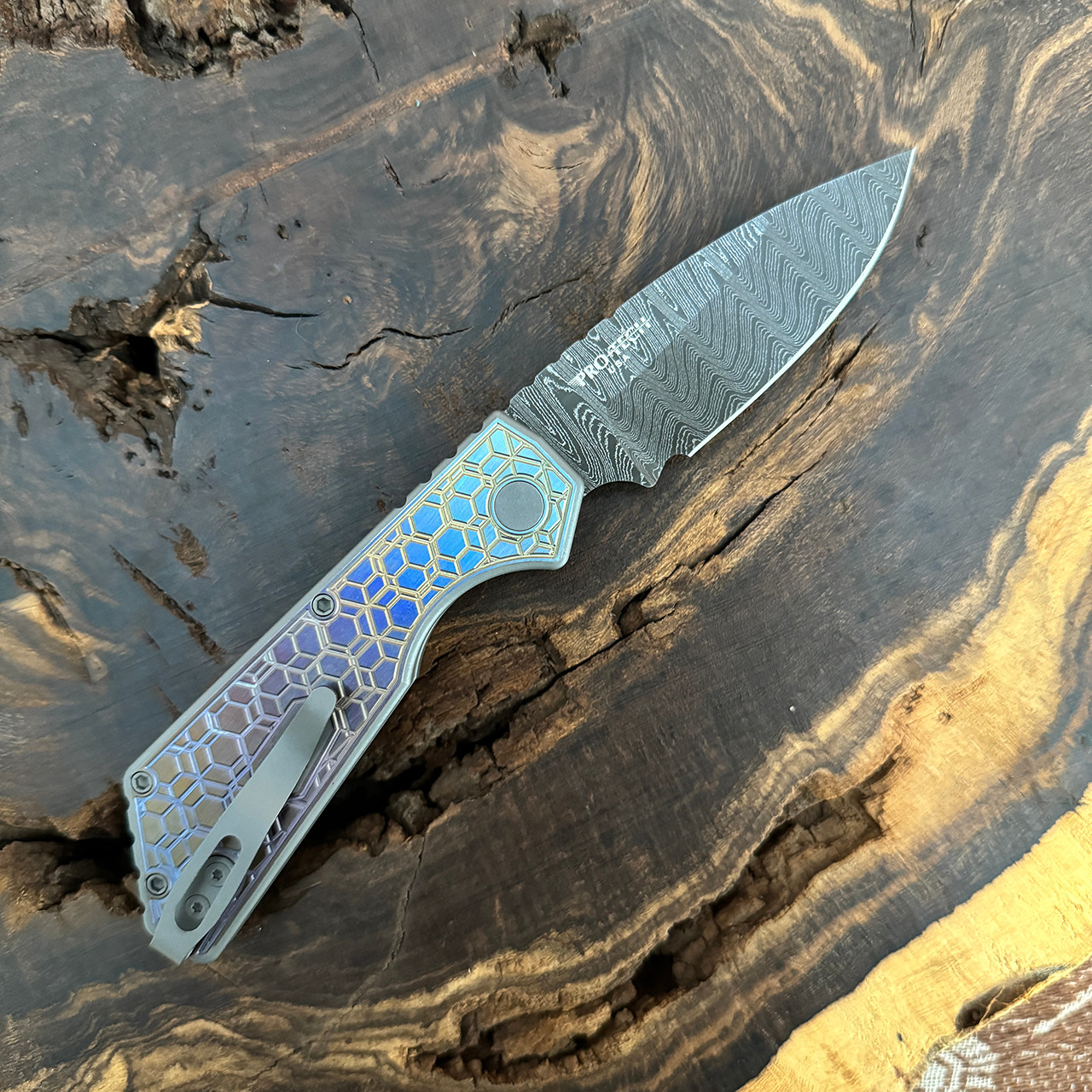 Pro-Tech Strider PT+ Auto Chipped Metal Unique Anodized Titanium