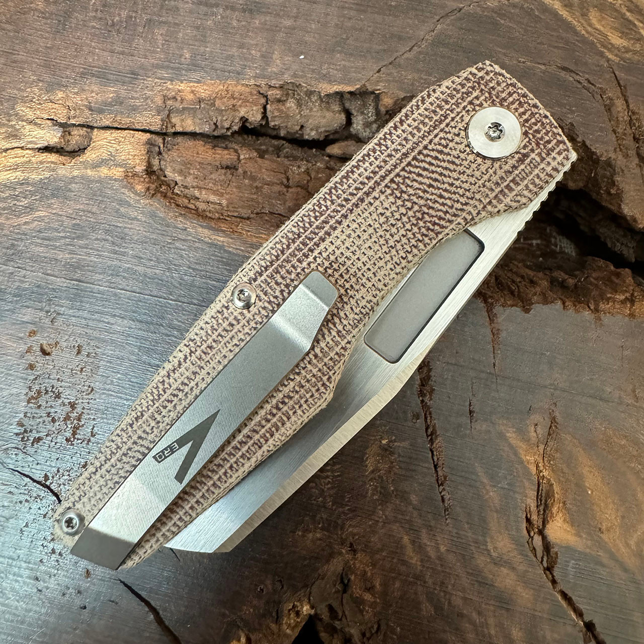 Vero Engineering Axon Mini Liner Lock Natural Micarta Handle Hand