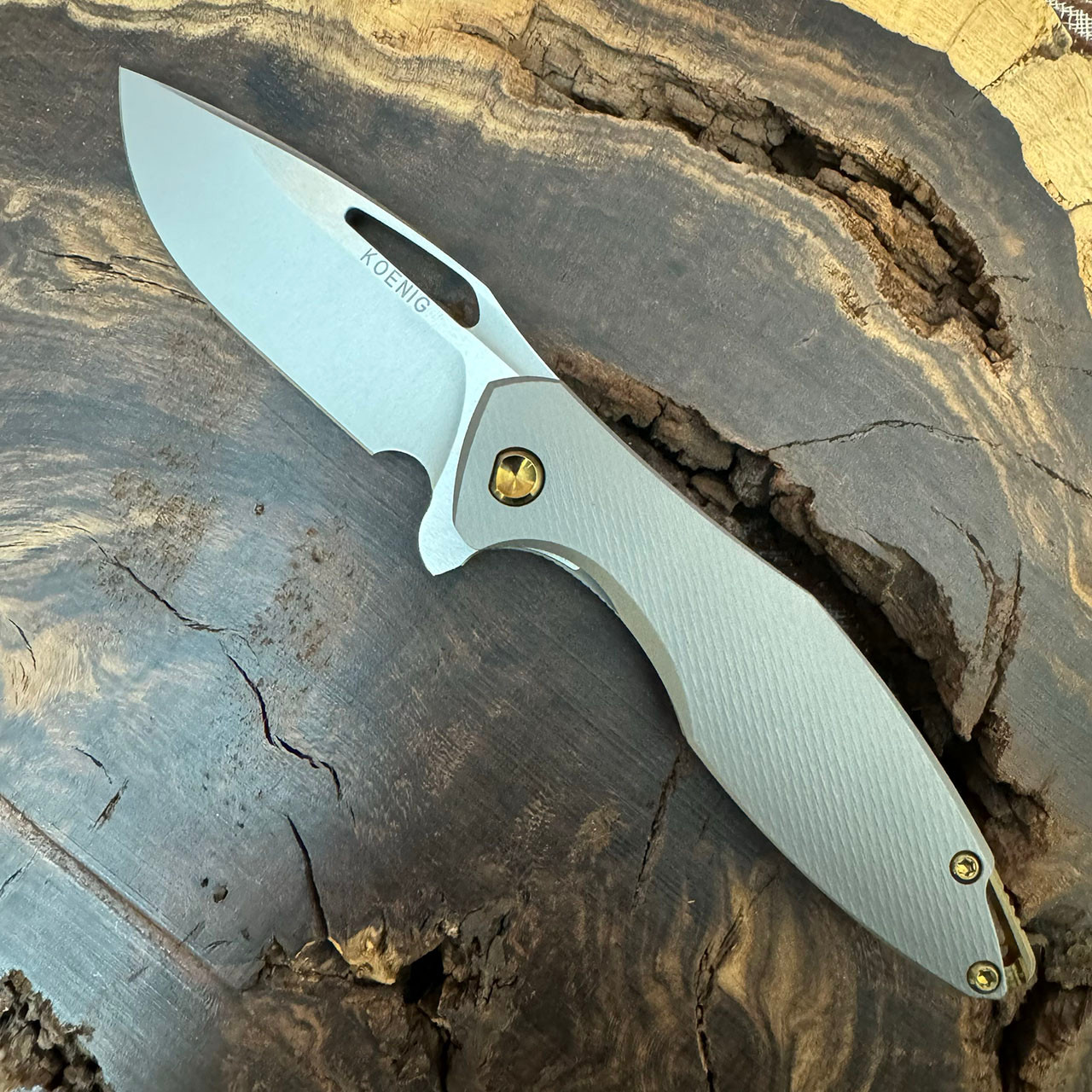 Koenig Knives Mini Arius Frame Lock Patterned Titanium Handle Burnished