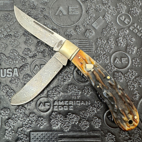Rough Rider Upswept Trapper Cinnamon Bone Damascus RR2525