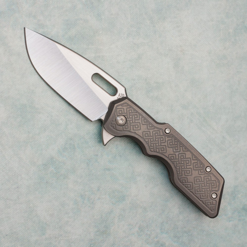 A2D Attn2Detail Mercantile Mark 1 Medium Folder S/E Celtic Knots Contoured Titanium Handle Satin Magnacut Rising Grind Blade