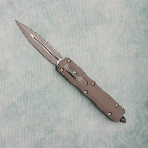 Microtech Dirac D/E Natural Clear Handle Apocalyptic Full Serrated 225-12APNC