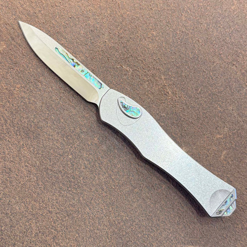 Heretic Knives Custom Hydra V4 OTF Auto S/E Stainless Steel Handle w/ Abalone Inlaid Button Cover, Button, Charging Handle, and Plate High Polish Blade
