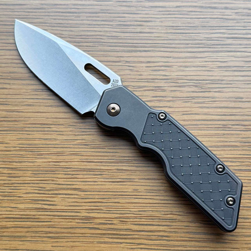 A2D Attn2Detail Mercantile Mark 1 Large Gen 4 Folder Blackwash Titanium Handle w/ Basketweave Inlays Stonewash/Satin Rising Grind Drop Point MagnaCut Blade