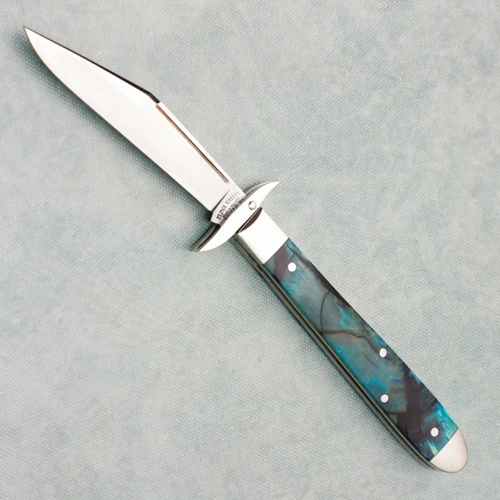 Tuna Valley Cutlery Co Mountain Cougar Blue Cross Cut Ivory Satin Clip Point 154CM Blade
