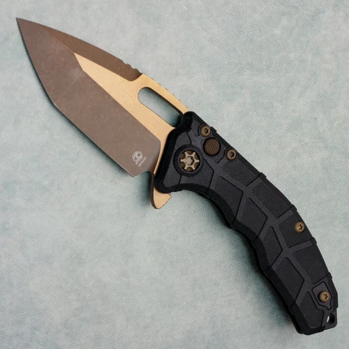 Heretic Knives Martyr Button Lock Manual Tanto Black Polymer Handles Bronze Blade H057-7A