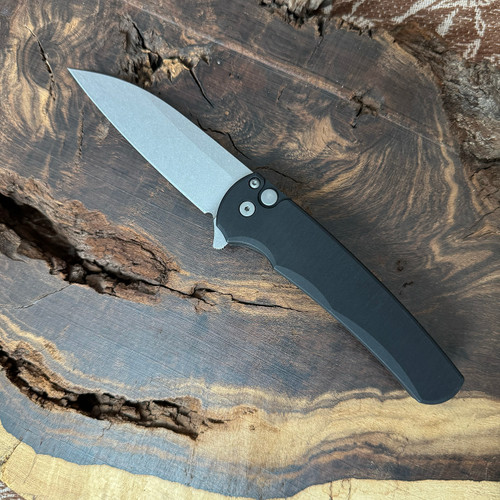 Pro-Tech Malibu Button Lock Flipper Wharncliffe Solid Black Handle Stonewash Magnacut Blade 5301