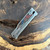 Reate EXO M S/E Gravity Knife Titanium Handle w/ Multi-Color G10 Damascus Pattern Inlay Satin Standard Blade