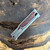 Reate EXO M S/E Gravity Knife Titanium Handle w/ Red Black G10 Damascus Pattern Inlay Satin Standard Blade