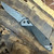 Benchmade Seven Ten Axis Lock Titanium Handle w/ Milled Aluminum Inserts Damasteel Blade Gold Class 710-241