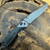 Benchmade Seven Ten Axis Lock Titanium Handle w/ Milled Aluminum Inserts Damasteel Blade Gold Class 710-241