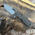 A2D Attn2Detail Mercantile Mark 1 Large Folder S/E Bronzed Hammered Ti Handle Stonewash Magnacut Rising Grind Blade