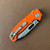 Demko MG AD20 V2 Clip Point Shark Lock Orange G10 Handle Stonewash MagnaCut Blade