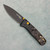 Benchmade Bugout Gold Class Axis Lock  Titanium Handles w/ Fatcarbon Stellar Onlays DualTone Cerakote Blade 535BK-251