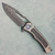 Heretic Knives Custom Wraith V4 Manual Bowie Hefted Titanium Handle w/ Damascus Inlays Vegas Forge SanMai Reptilian Damascus Blade Abalone Button